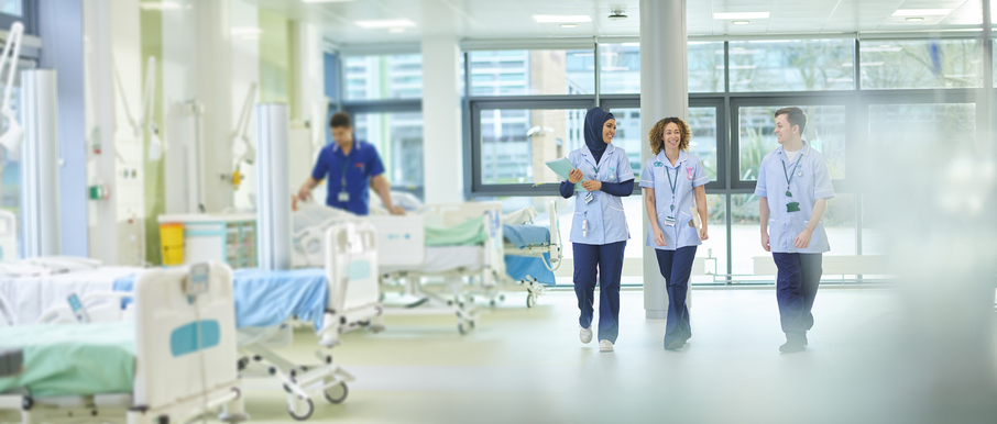 nurses walk on a hospital unit
