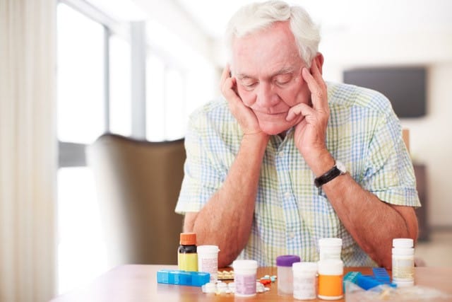 man with medications