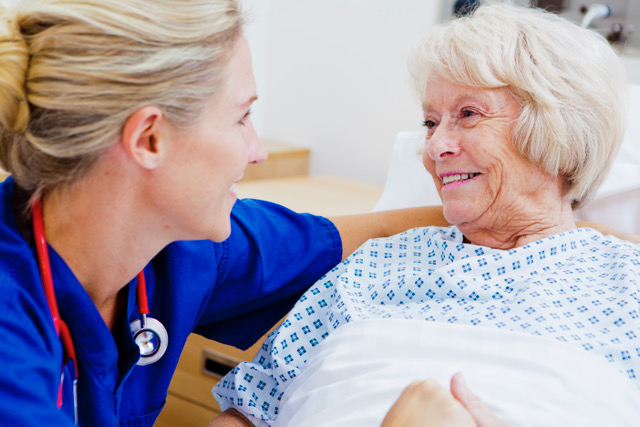 nurse caring for patient