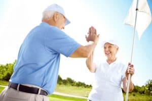 couple golfing